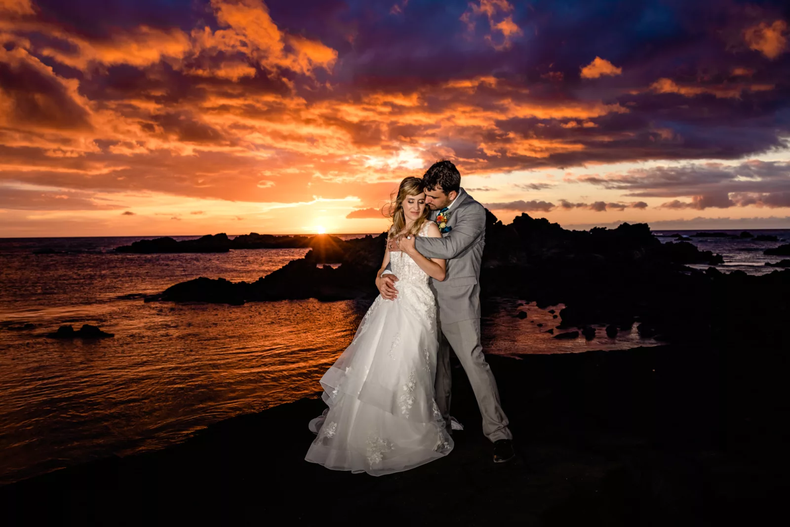 Stunning skies for our couple on lava rock after eloping on the Big Island