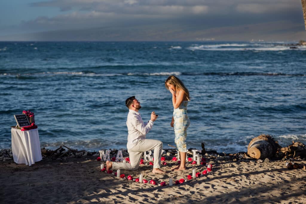 Hawaii proposal on the beach followed by Big Island engagement photos at sunset